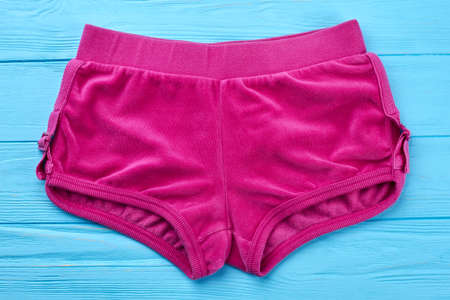 Pink velour shorts for girl. Velvet elegant short trousers for women.の写真素材