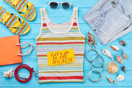 Women summer accessories background. Summer fashion look, sea background.