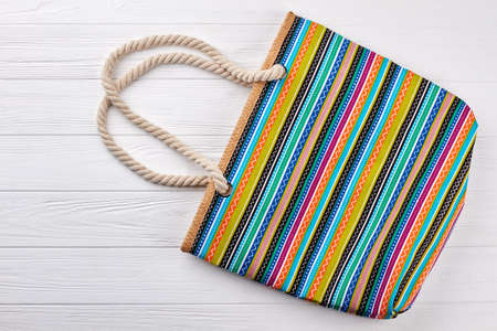 Modern textile beach handbag. Carry personal things in contemporary striped bag. Summer fashion style.の写真素材