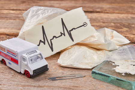 Narcotics overdose and emergency ambulance. Drugs addiction leads to problem with heart.