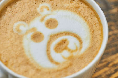 Latte art bear. Coffee foam close up.の写真素材
