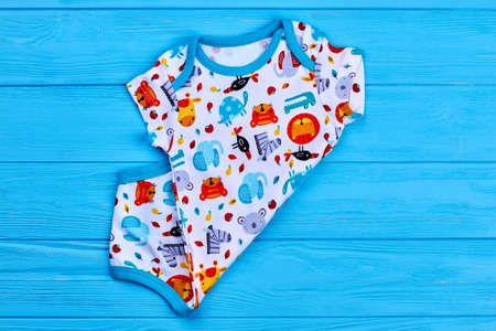 Baby boy new organic bodysuit. Trendy summer romper for newborn on sale.の写真素材