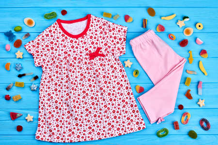 Collection of infant girl summer garment. Natural brand summer clothing for little girls. Baby-girl summer casual apparel.の写真素材