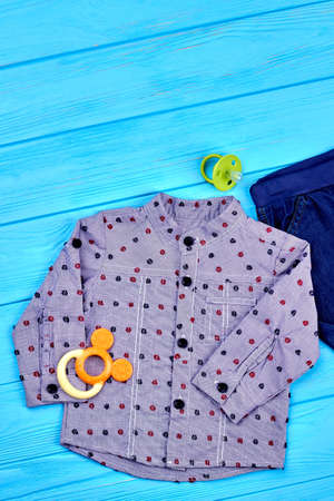 Baby-boy high quality autumn shirt. New brand apparel for infant boys on sale, accessories. Trendy clothes for little boys, top view.の写真素材