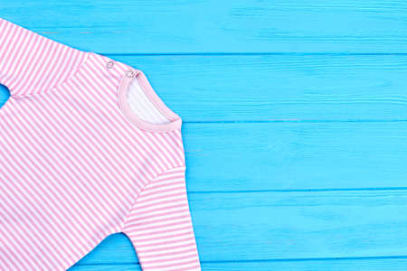 Natural cotton striped clothes for baby. Infant baby natural striped apparel and copy space. Infant kids brand clothes.の写真素材