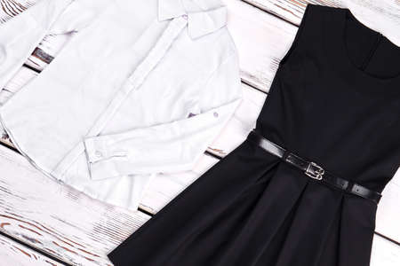 White shirt and black dress for girls. Little girls black and white clothes on sale. Cute brand apparel for little girls.の写真素材