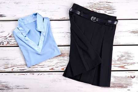 Beautiful set of school clothes for girl. New light blue girls blouse and black pleated skirt for...