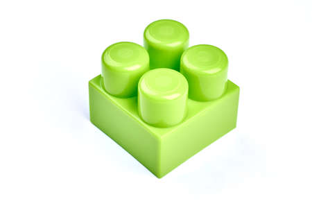Plastic consructor on white background. Green toy for child isolated on white background.の写真素材