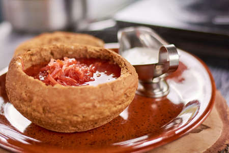 Ukrainian national red soup. Delicious ukrainian soup with red red beets and sour cream. Traditional...
