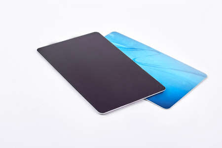 Digital tablet with blue case on white background, studio shot. Modern portable technology.の写真素材