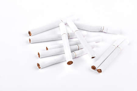 Many cigarettes on white background.の写真素材