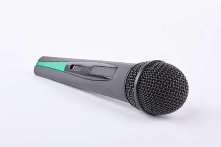 Wireless black microphone, white background.の写真素材