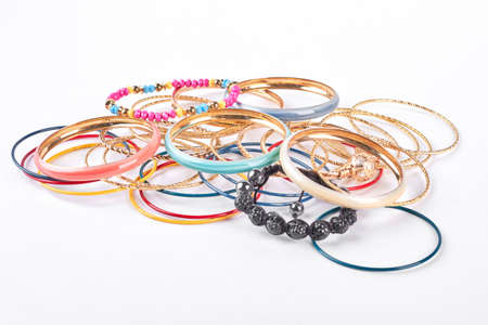 Collection of women fashion bangles. Female jewelry on white background.の写真素材
