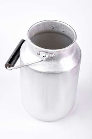 Retro aluminium milk jug, white background. Vintage milk can isolated on white background.の写真素材