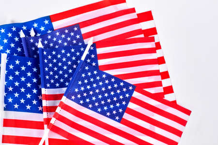 Small table flags of USA. Collection of cocktail flag of United States of America close up.の写真素材