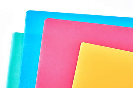 Colored paper folders close up. Set of blank multicolored envelopes for documents, cropped image. Paper work and stationery concept.の写真素材