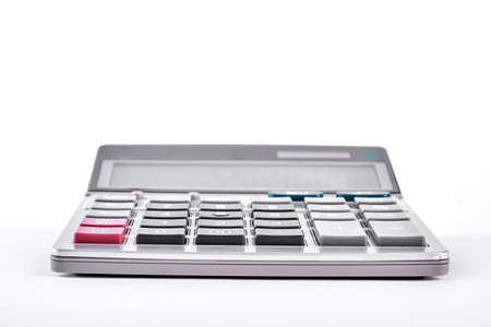 Calculator on white background. Digital gray calculator isolated on white bacground. Business and finance concept.の写真素材