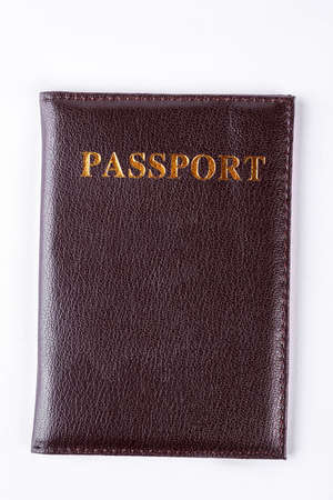 Brown leather passport cover isolated on white background.の写真素材