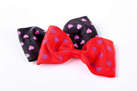 Two bow ties on white background. Girls fashion hair bows on white background. Kids hair accessory.