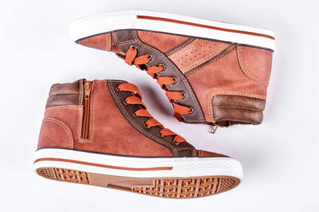 Pair of leather sport trainers isolated on white background. Fashion collection of sport shoes.の写真素材