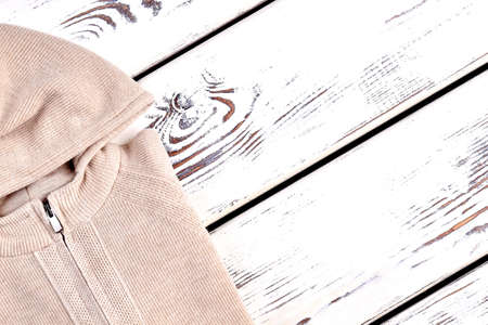 New hooded sweater, copy space. Girls hooded knitwear on sale. Casual knit apparel for kids.の写真素材