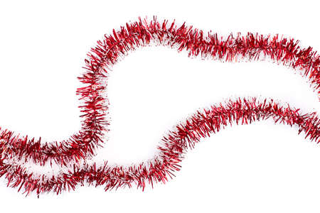 Red and white tinsel, white background. Thin red and white Christmas garland isolated on white...