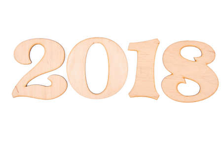 Wooden numbers forming the number of New Year. Wooden carved numbers forming digit 2018 from light wood on white background, New Year idea.の写真素材