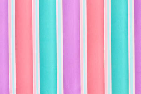 Multicolor stripes background. Multicolored striped gift paper wallpaper. Colorful striped abstract background.の写真素材