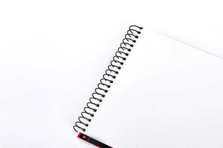 Spiral binder notebook, white background. Open empty notepad with clipping path. Blank page of...