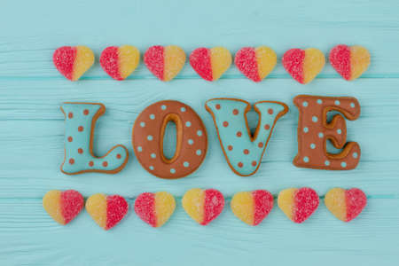 Word love from baked cookies. Cookies with dots in shape of word love. Valentines Day background.の写真素材