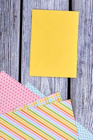 Blank card and patterned paper sheets. Set of colorful patterned paper for handmade craft on old...
