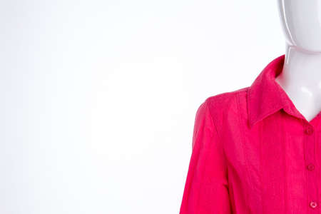 Mannequin in blouse, copy space. Female mannequin in red cotton shirt, cropped image. Feminine trendy outfit. Fashion boutique clothing sale.の写真素材