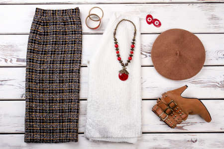 Layout womens outfit with accessories. Casual and elegant, checkered trousers, high heels shoe,...