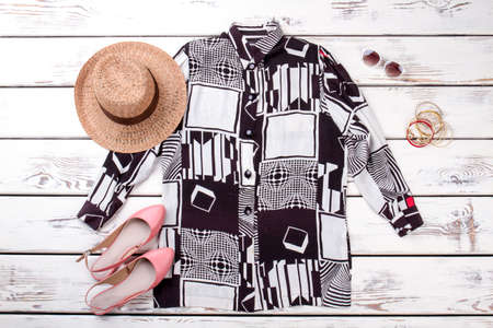 Women summer clothing with accessories. Flat lay. white background. White wooden background.の写真素材