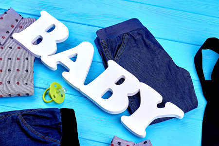 Trendy collection of clothes for baby-boys. Toddler boys elegant clothes and accessories background.の写真素材