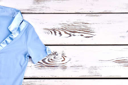 Girls short sleeve blue shirt. New girls light blue school blouse and copy space.の写真素材