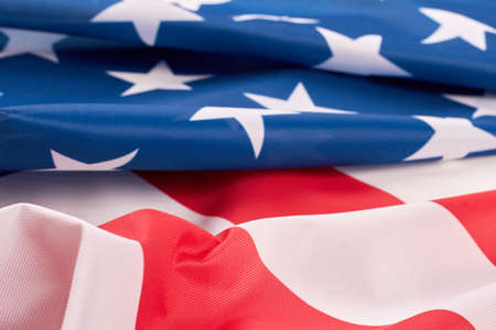 Folded American flag close up. Detail of the national flag of the USA. America national symbol.