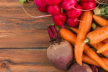 Different vegetables on wood. Close up. Top view.