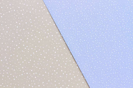 Delicate blue and gray paper patterned background. Beautiful paper with a pattern of snow for winter...
