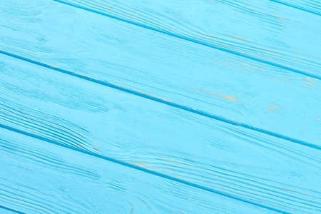 Blue wooden background. Close up painted wood texture with space for crativity. Colored background for banner.の写真素材