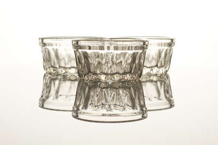 Glass sauce cups. White isolated background.の写真素材