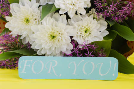Close up flowers and card with inscription for you. Romantic floral background. Birthday, Anniversary or Valentines Day.の写真素材