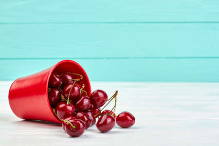 Ripe juicy cherries and copy space.の写真素材