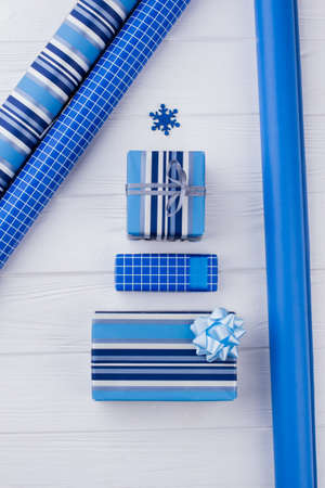 DIY gift wrapping. Preparation for winter holidays. How to wrap New Year present at home.の写真素材