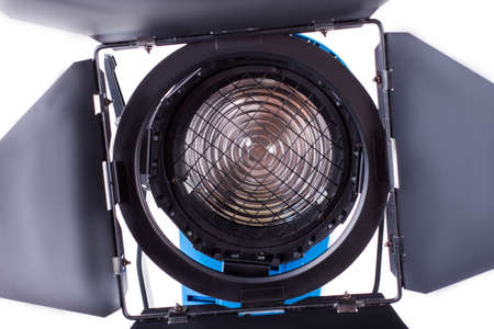 Studio lighting on white background close up. Flashlight with light barn door. Detail view of...