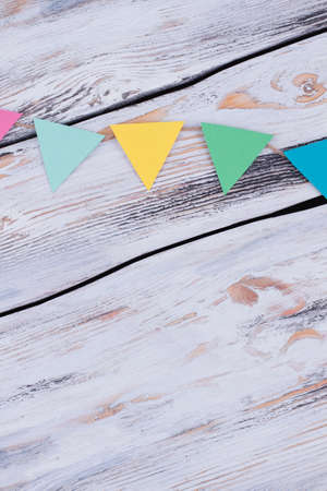 Paper triangle banner flags. Garland with colorful pennants. Design celebration, colorful flags background.の写真素材