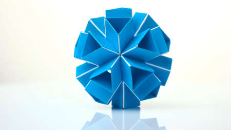 Blue kusudama figure on white background. Amazing paper decoration. Perfect kusudama model.の写真素材