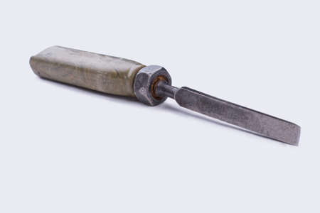 Chisel isolated on white background. Vintage handle tool for carpenter wood working on the white background.の写真素材