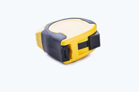 Builders tape measure isolated on white background. Measuring roulette, horizontal image.