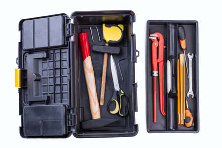 Hand tool kit. Black box with tool set isolated on white background.の写真素材